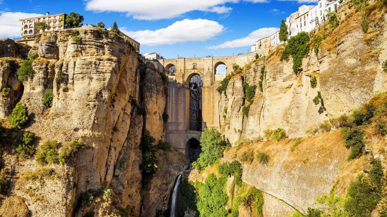 The historic town of Ronda in Andalusia, built on cliffs above a deep gorge spanned by its stone bridge