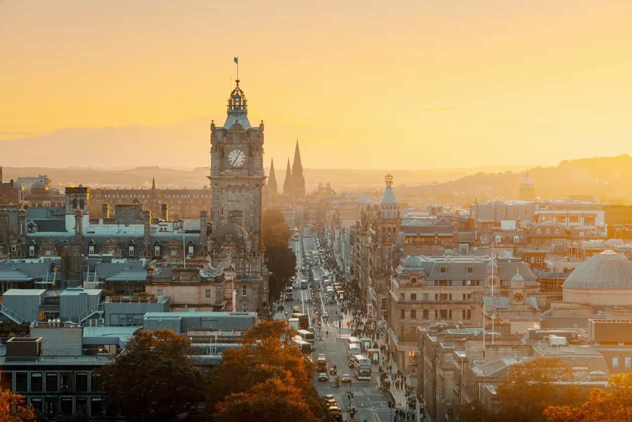 The Edinburgh skyline seen from Calton Hill, with the castle and old town at dusk